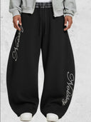 PANTALONI DI TUTA CON ELASTCO QUADRI  IN VITA STAMPA BRILLANTINTA