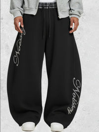 PANTALONI DI TUTA CON ELASTCO QUADRI  IN VITA STAMPA BRILLANTINTA