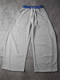 PANTALONI DI TUTA NOISSEY CON ELASTCO IN VITA A QUADRI E GAMBA CURVA STREETWEAR