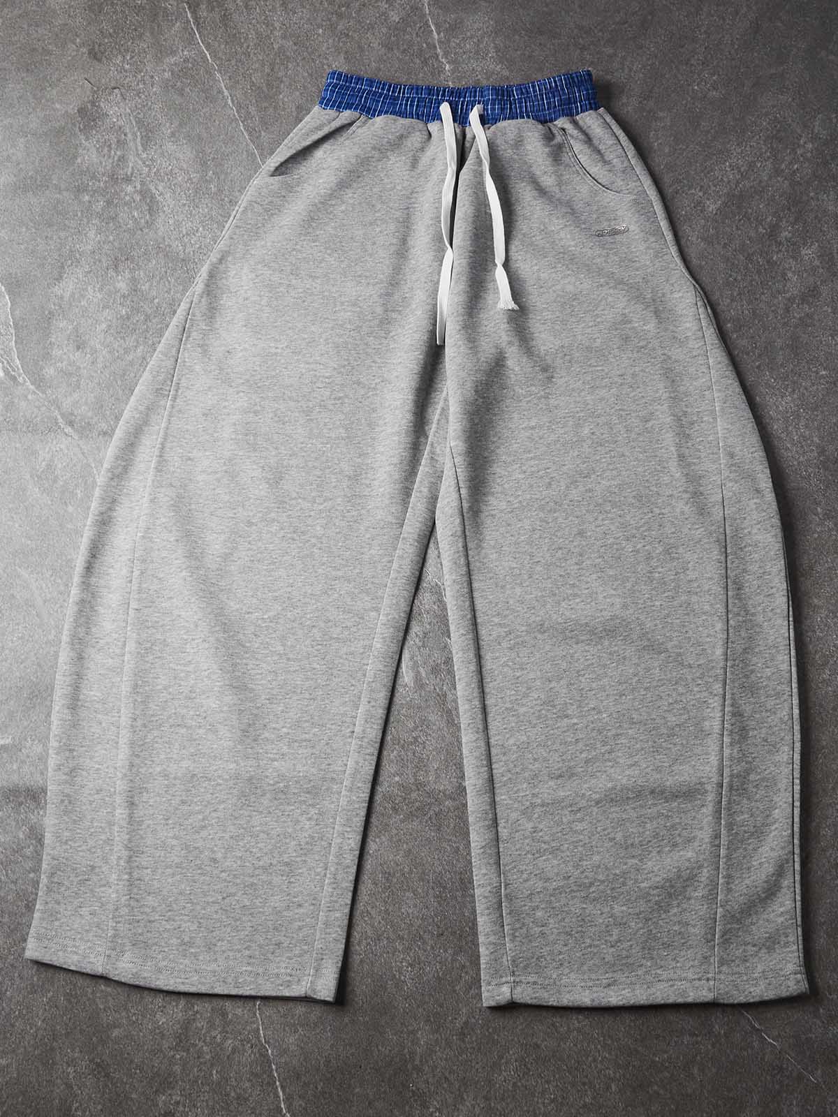 PANTALONI DI TUTA NOISSEY CON ELASTCO IN VITA A QUADRI E GAMBA CURVA STREETWEAR