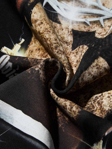 T-SHIRT OVERSIZE NERO CON STAMPA CORONA DI SPINE DI DIAMANTI   - NOISSEY